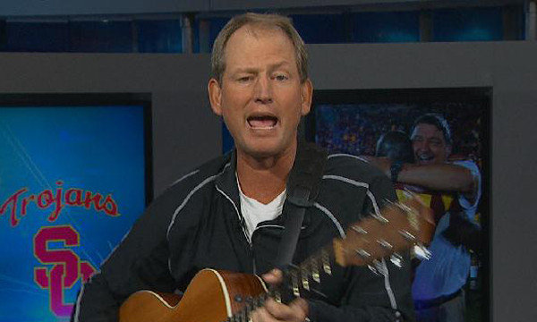 lat-sp-neuheisel-song-photo-20131121.jpeg