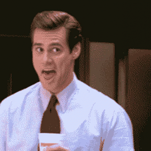 jim-carrey-fake-smile.gif